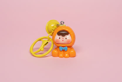 Nyckelring med bjällra och bebis i söta dräkter