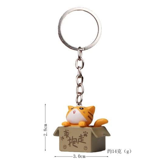 Kawaii Katt Nyckelring - Söt Miniatyrkatt i Låda 3x3 cm