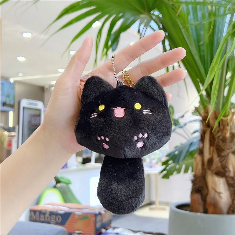 Söt svart kattnyckelring med pipsvans - kawaii plyschaccessoar